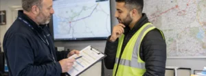 Man checking insurance details of driver
