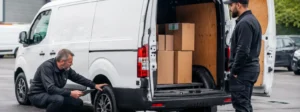 Employer checking the drivers tyres