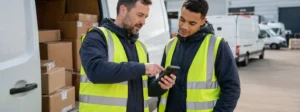 Employer / driver pointing at a phone, explaining the role